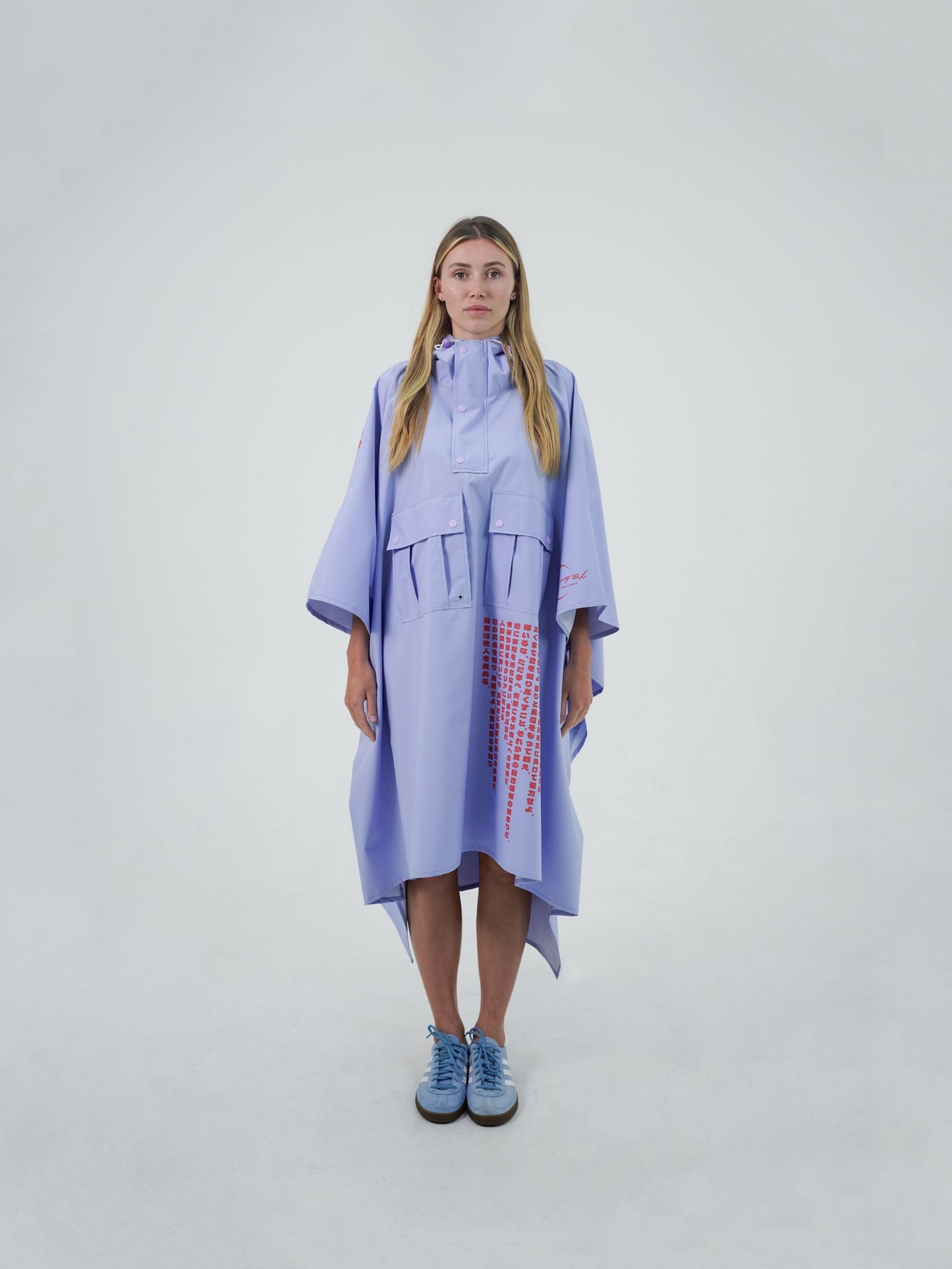 Raincoat, Japanese design, Bali, travel, adventure, style, Despo fabric, Taslan fabric, water-resistant, breathable, lightweight, packable, ethical manufacturing, sustainable fashion.