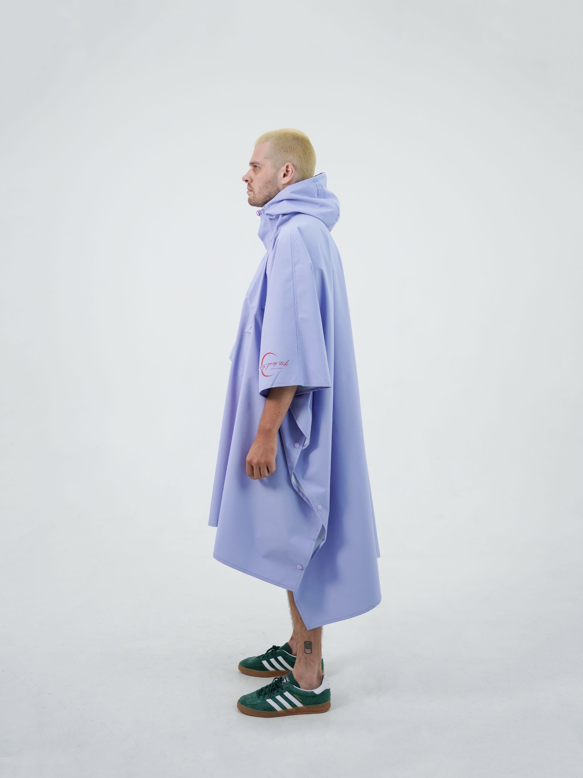 Raincoat, Japanese design, Bali, travel, adventure, style, Despo fabric, Taslan fabric, water-resistant, breathable, lightweight, packable, ethical manufacturing, sustainable fashion.