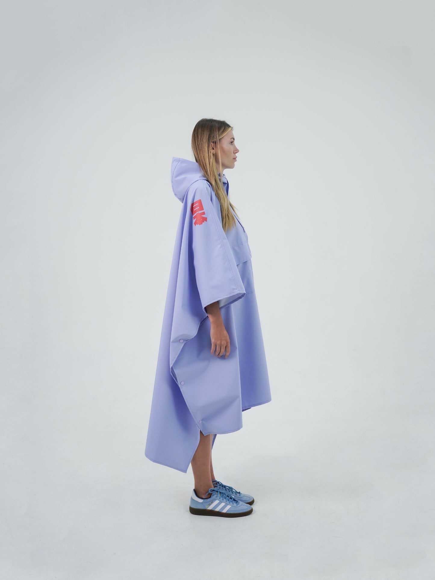 Raincoat, Japanese design, Bali, travel, adventure, style, Despo fabric, Taslan fabric, water-resistant, breathable, lightweight, packable, ethical manufacturing, sustainable fashion.